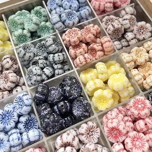 Macro view of vintage-style colorful glass flower beads for DIY jewelry making
