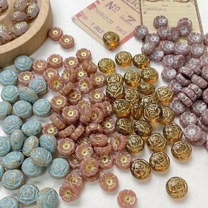 Hand-painted Czech glass beads with rose and floral patterns for DIY jewelry making