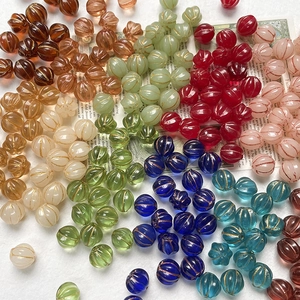 Retro Czech glass pumpkin beads with gold accents for DIY jewelry making and crafts