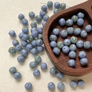 Detail of 8mm Czech glass beads with hand-painted roses and silver crackle for DIY jewelry