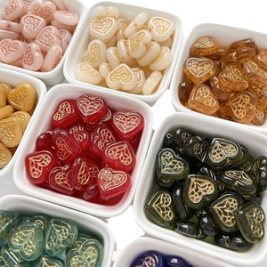 Vintage hand-painted heart-shaped glass beads with gold floral patterns for DIY jewelry
