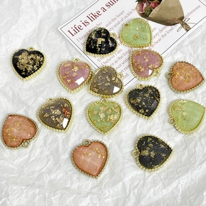 DIY heart pendants with gold foil inlay and metallic edges for jewelry making