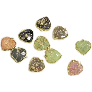 DIY gold-plated heart charms with foil inlay and bead textured edges for jewelry making