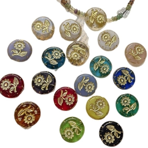 Vintage gold-stamped Czech style glass beads with floral patterns for DIY jewelry making