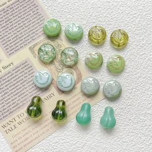 Czech glass bird beads and green waterdrop charms for DIY jewelry making and bracelets