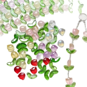 Colorful glass tulip beads and green leaves for DIY handmade jewelry crafting
