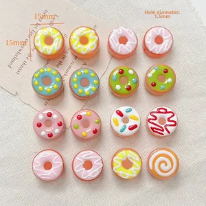 Macro detail of 15mm colorful resin donut beads for DIY jewelry with 1.5mm holes