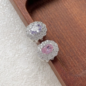 Elegant silver-plated vintage floral studs with purple and pink stones and cubic zirconia