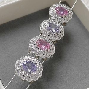 Elegant silver-plated floral spacer beads with pink and purple gemstones and zircon