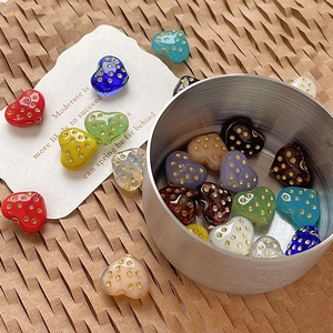 Handmade heart-shaped glass beads with vintage gold polka dots for DIY jewelry making