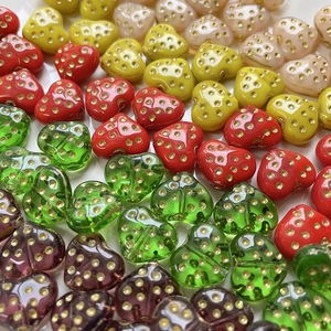 Handmade heart-shaped glass beads with vintage gold polka dots for jewelry DIY crafting