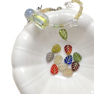 Bracelet fait main et perles en verre feuille dorées de couleurs variées pour bijoux