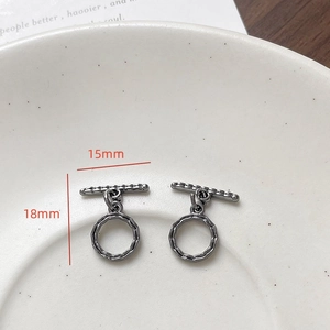 Detailed view of gunmetal heart-shaped toggle clasp with textured finish for DIY jewelry