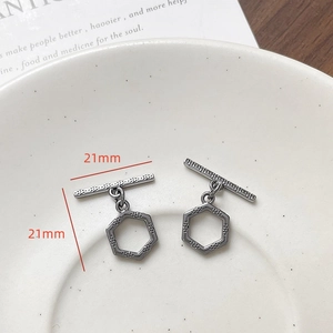 Detailed view of gunmetal hexagon heart-textured OT clasp jewelry connector 21mm