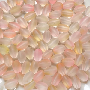 Macro view of pastel gradient frosted acrylic beads for DIY jewelry making and crafting