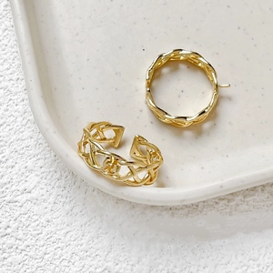 Close-up of 14k gold-filled hollow woven ring base and DIY jewelry making findings