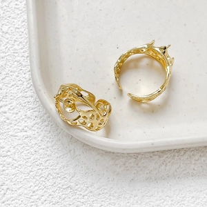 Detail of 14k gold plated hollow open ring base for DIY jewelry making and pearl setting