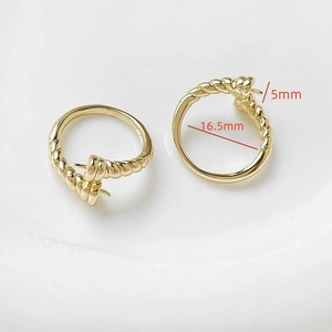 Close-up of 18k gold plated ring component with twisted rope texture for DIY jewelry