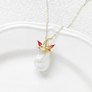 Baroque pearl necklace pendant with gold ghost wizard hat design and wing details