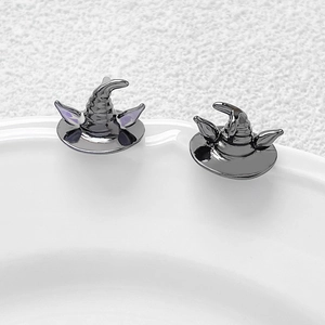 Close-up of wizard hat pins in gun-black finish with purple ear details for DIY jewelry