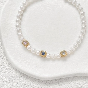 18k gold plated pearl necklace featuring three square pendants with colorful zircon stones