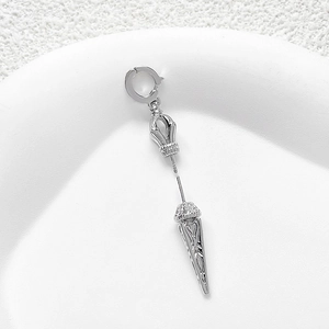 Silver-plated metal vajra pendant earring with intricate baroque relief carvings