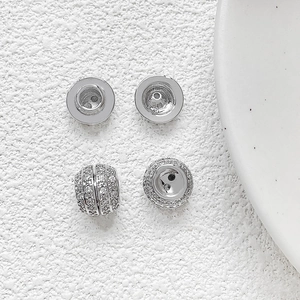 Macro shot of silver plated screw clasp connector with zircon stones for DIY jewelry