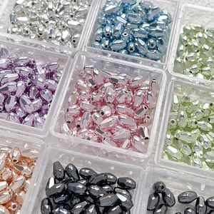 Macro view of assorted colorful faceted glass spacer beads for DIY jewelry making