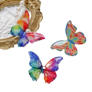 Papillons en résine pailletée colorée pour accessoires de cheveux DIY et artisanat