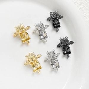 Detailed set of gold, silver and black dragon charms for DIY jewelry making and crafts