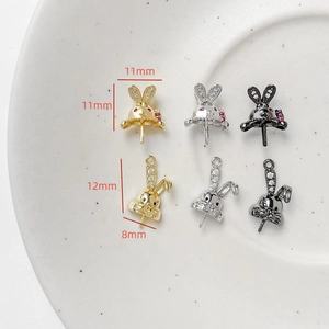 Detailed view of rabbit-shaped jewelry parts with zircon accents and size measurements