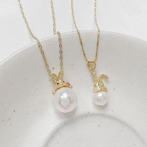 Gold plated rabbit pearl pendants with sparkling zircon stone accents for jewelry making