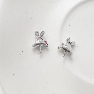 Macro shot of 18K gold plated bunny earring findings with zircons for DIY jewelry