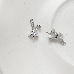 Macro detail of silver rabbit jewelry finding with sparkling stones for DIY pearls