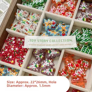 Macro detail of hand-painted Christmas tree glass beads with 22x26mm size and 1.5mm hole