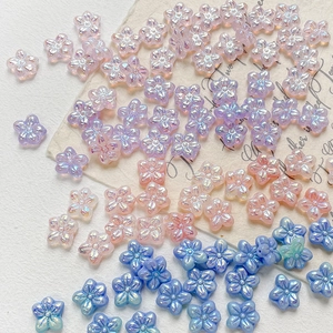 Iridescent flower-shaped Czech glass beads for DIY jewelry in pastel purple and blue