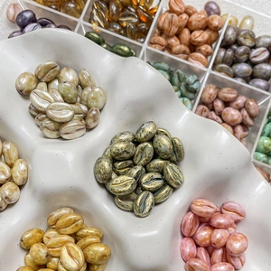 DIY coffee bean shaped beads with metallic finish for handmade jewelry crafting