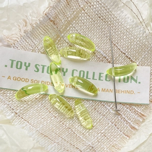 Pale yellow-green translucent banana-shaped glass beads for DIY jewelry making
