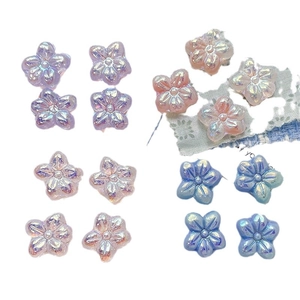 Iridescent flower-shaped resin beads in pastel colors for DIY jewelry making and crafts