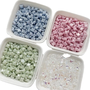DIY Czech glass star beads in four pastel colors for handmade jewelry and necklaces