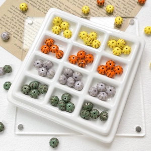 Miniature Czech glass pumpkin beads in assorted colors for DIY jewelry making