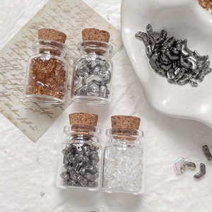 Arrowhead Czech glass beads in amber, silver, black, and white for DIY jewelry making