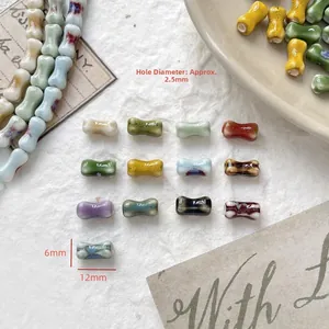Close-up of 12x6mm bone-shaped ceramic beads for DIY jewelry with various glaze colors