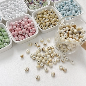 Glazed ceramic beads in assorted colors for DIY jewelry making and bracelet crafting