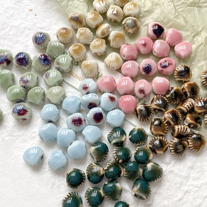 Glanzende kleurrijke keramische kralen met schelptuintje voor DIY-sieraden