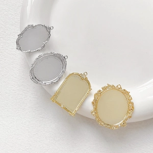 Detail of vintage 18k gold and silver plated Baroque pearl frame pendants for DIY jewelry