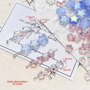 Detailed macro view of 8mm and 11mm star-shaped colorful glass beads for DIY jewelry