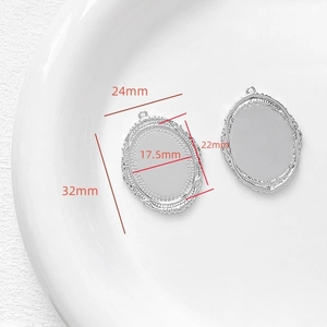 Macro detail of silver vintage oval DIY pendant trays with precise size measurements