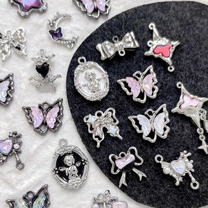 Lot de breloques Y2K en alliage argenté avec étoiles papillons et anges pour bijoux DIY