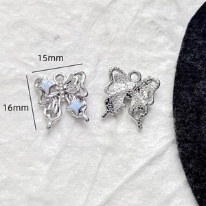 Pendentif papillon en alliage argenté avec étoile bleue, breloque bijoux 15x16mm